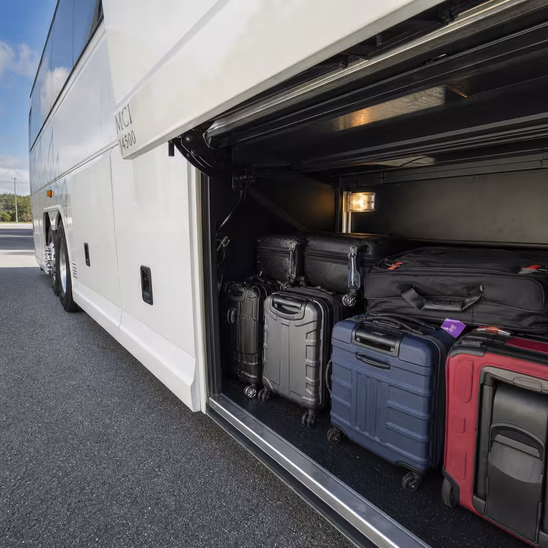 Party bus interior with wraparound leather seating and LED lighting in Scottsdale