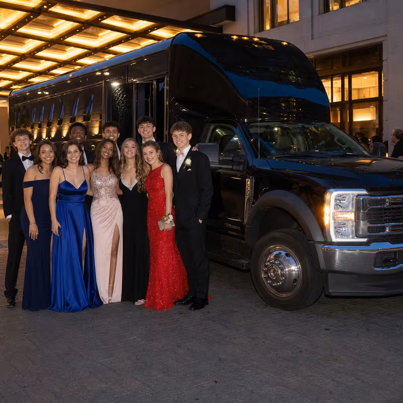 Party bus interior with wraparound leather seating and LED lighting in Scottsdale