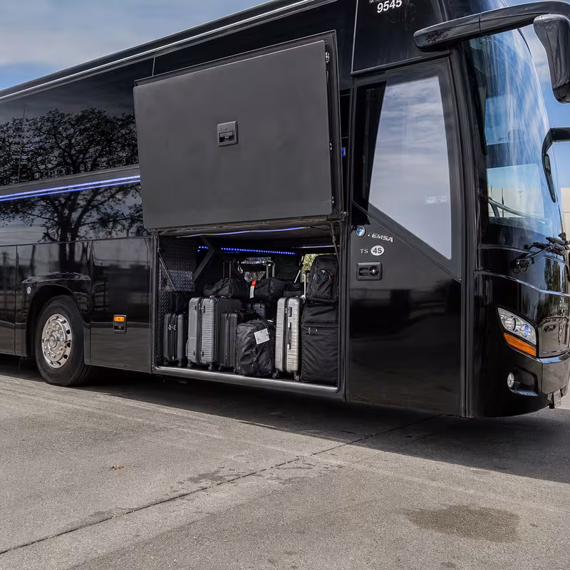 Party bus interior with wraparound leather seating and LED lighting in Scottsdale
