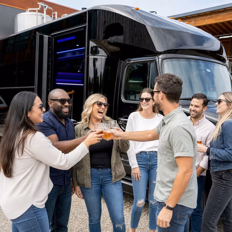 Passengers loading luggage while boarding an Scottsdale group shuttle